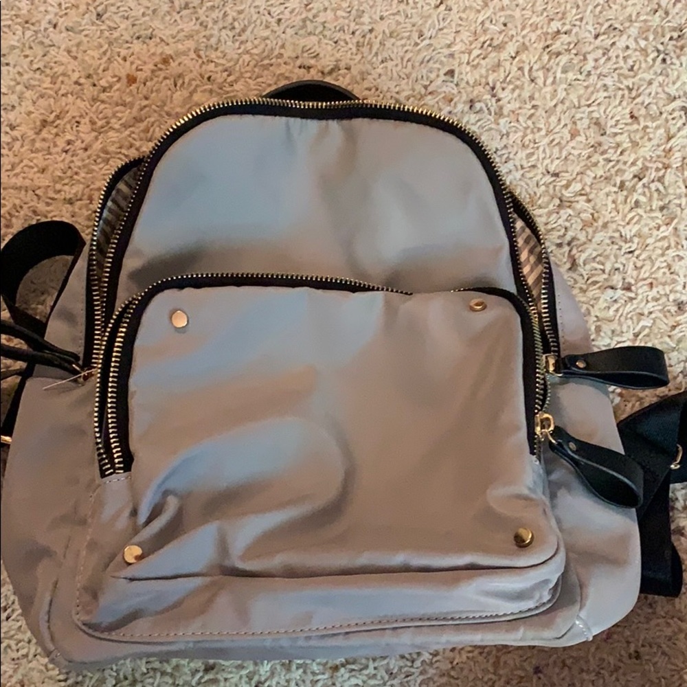 Light grey backpack MMS brand